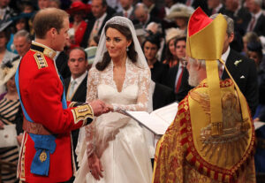 . Prince William and Kate Middleton exchange rings in front of the Archbishop of Canterbury at Westminster Abbey, London.